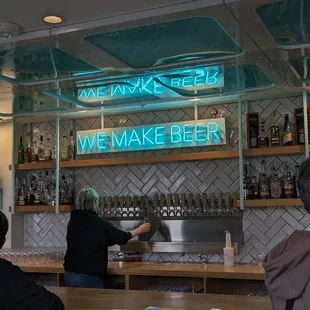 a man and a woman at a bar