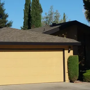 Tore of wood shakes sheeted roof 7/16 O.S.B board installed IKO weathered wood IKO lifetime roof shingles