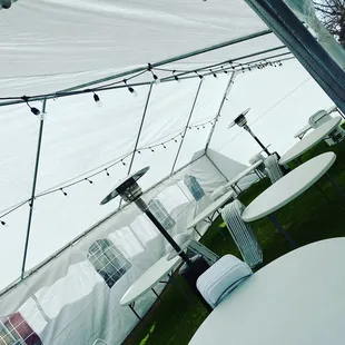 20x40 canopy, 8 tables with chairs, lighting, and heaters