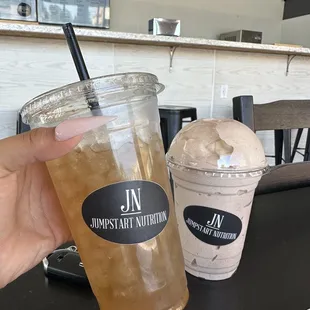 Lemon tea with cranberry aloe shot and cinnamon roll post workout shake