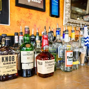 a row of liquor bottles