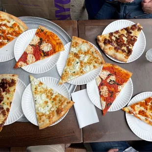 2 slices each of Ricotta, Margherita, BBQ, and Buffalo.