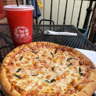 a pizza and a drink