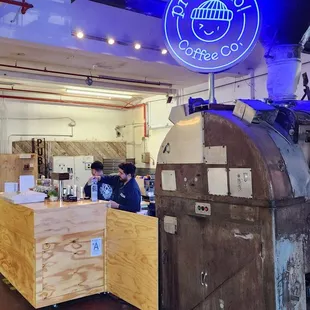 a man working in a coffee shop