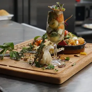 a wooden cutting board with food on it