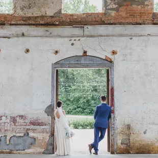 Couple standing inside at Providence Cotton Mill
