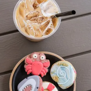 a plate of cookies and iced coffee