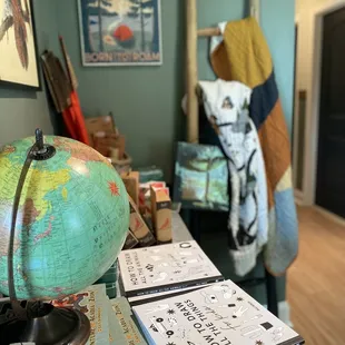 a globe, books, and other items