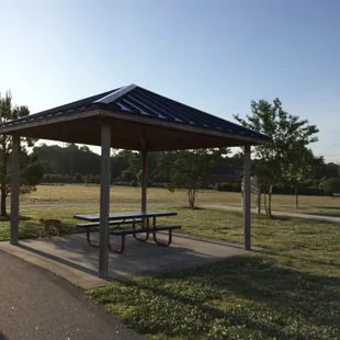 There are a few covered picnic tables