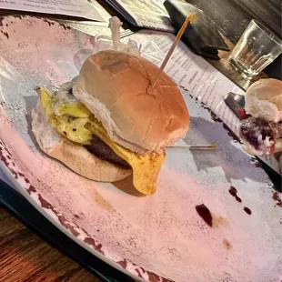 Sausage, egg, and cheddar slider...triple B slider in the background