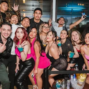 a group of people posing for a picture