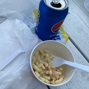 Cold macaroni salad and pepsi