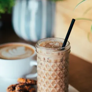 a cup of coffee and a cookie