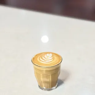 a latte on a table