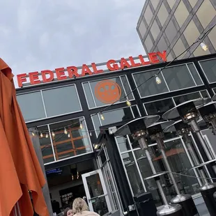 people sitting outside a restaurant