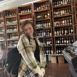 My friend &amp; the wine wall.