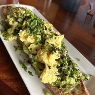 Avocado toast with scrambled egg, yum.