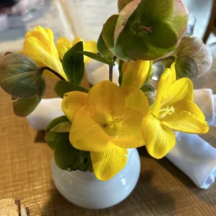 Fresh flowers on every table.