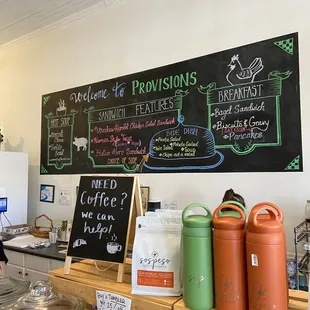 a chalkboard with a variety of items on it