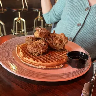 a plate of fried chicken and waffles