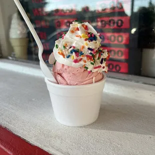 Kids size strawberry ice cream with whipped cream