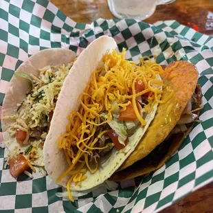 Combination of three tacos: soft blackened chicken taco, beef taco and the Truck Stop.