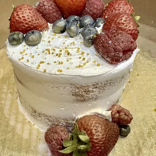 My corrections with small strawberries, gold cake spray and sprinkles.