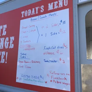 a menu on the side of the truck