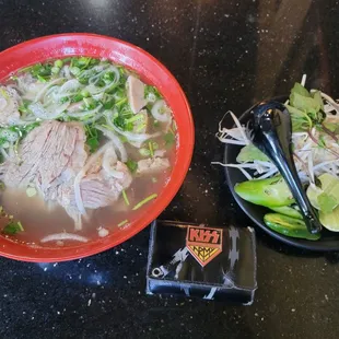 a bowl of soup and a plate of vegetables