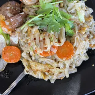 Combination stir fry with 10A. PAD THAI NOODLES STIR-FRIED WITH COMBINATION- H TIU XO C BIT