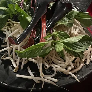 a plate of noodles and vegetables