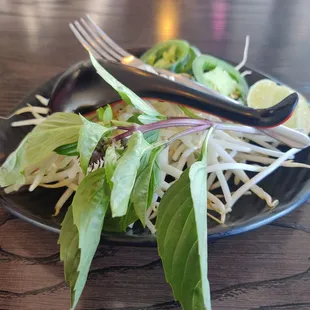  plate of salad with a fork