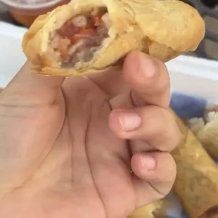 First bite of undercooked pork egg roll