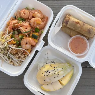 a variety of foods in a styrofoam container