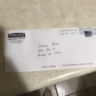 a person's foot on a table