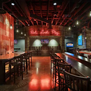 a bar with a neon sign
