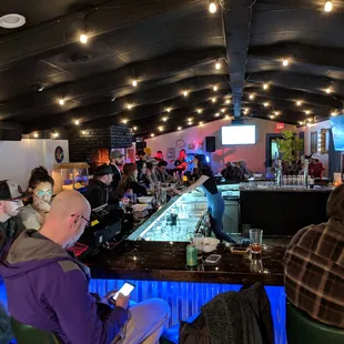 people sitting at the bar