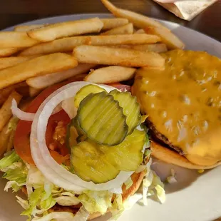 Yummy cheeseburger and fries.