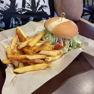 Spicy burger with fries