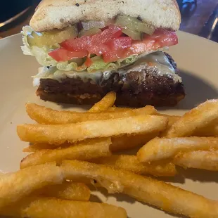 Elk Burger had a great taste, this is only half portion. Menu limited. has I don't recommend for dinner This is a bar setting restaurant.