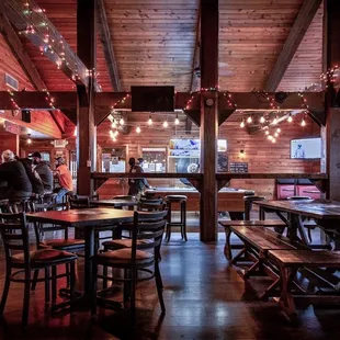 the interior of a rustic restaurant