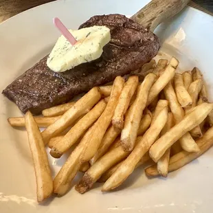 a steak and french fries on a plate