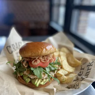 a sandwich and chips on a table
