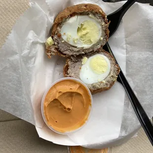 a sandwich with an egg in it
