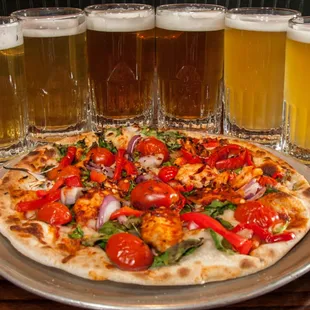 Spicy Baja Chihuahua pizza and pairs of house-brewed beer!