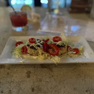 Crab cakes with a blackberry gin and tonic