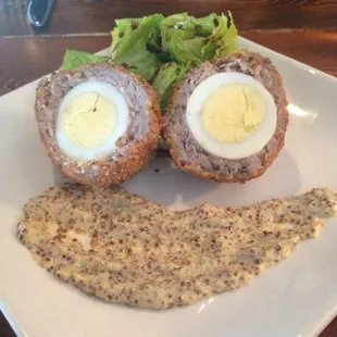 Scotch egg wrapped in sausage! House specialty. What!?!?