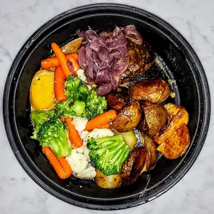 Grilled 8oz Filet Mignon topped with a Blu Cheese Demi topped with Confit Red Onion. $32