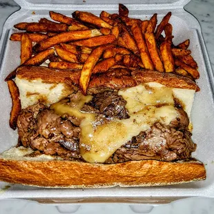Pub&apos;s Hot Roast Beef in Au Jus with Cheddar Cheese and Horseradish Sauce on a Long Roll $13