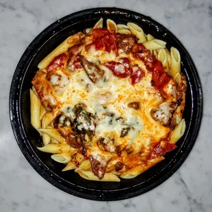 Dinner Special: Filet Tips with Roasted Peppers, Broccoli Rabe and mozzarella over Penne in a spicy red sauce. $22